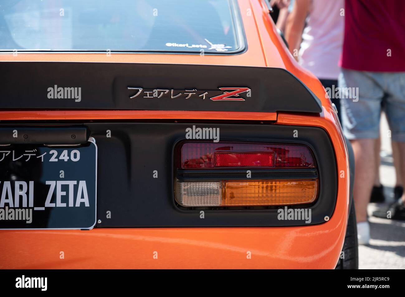 The details on a classic orange Japanese Datsun 240z parked at a exhibition Stock Photo