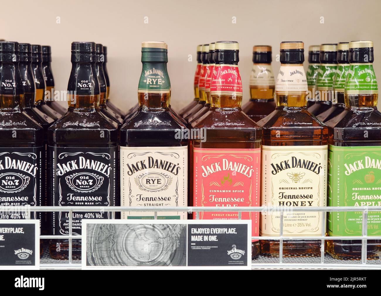 Helsinki, Finland - 09 August 2022: Selection of bottles of Jack Daniels whiskey on alcohol shop shelf Stock Photo