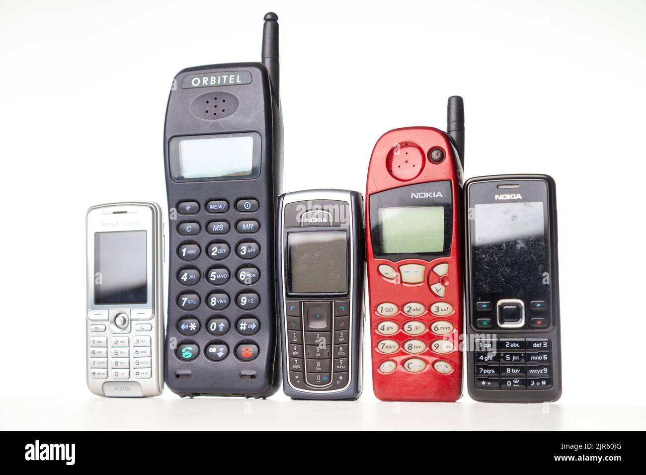 A group of old out dated mobile dumb phones Stock Photo