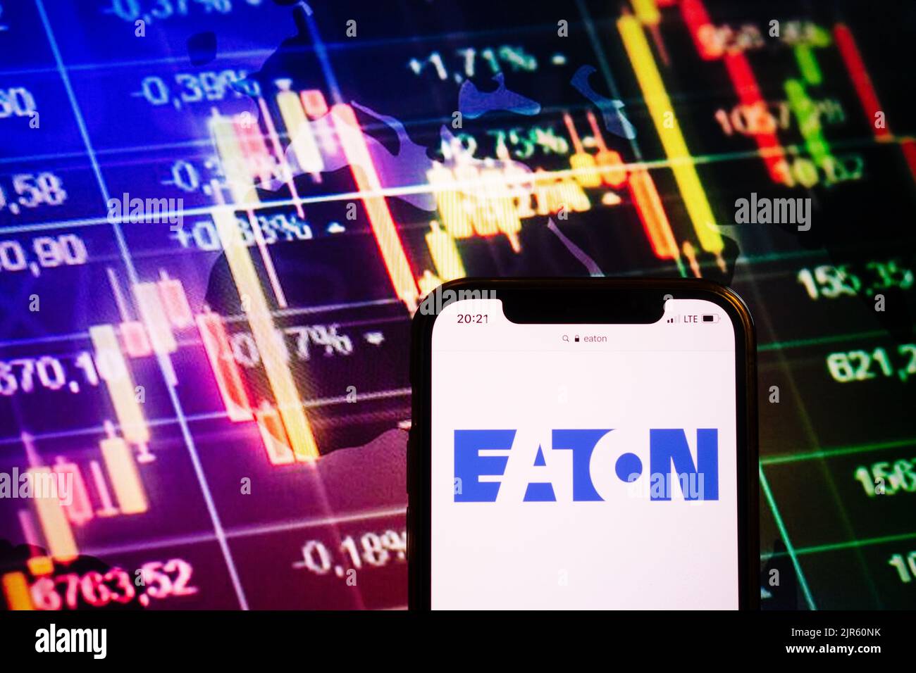 KONSKIE, POLAND - August 10, 2022: Smartphone displaying logo of Eaton company on stock exchange diagram background Stock Photo