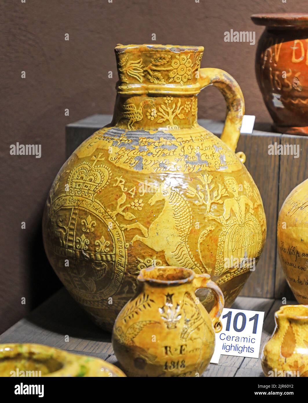 A large slipware jug dated 1741, on display at the Potteries Museum and Art Gallery, Hanley, Stoke-on-Trent, Staffs, England, UK Stock Photo