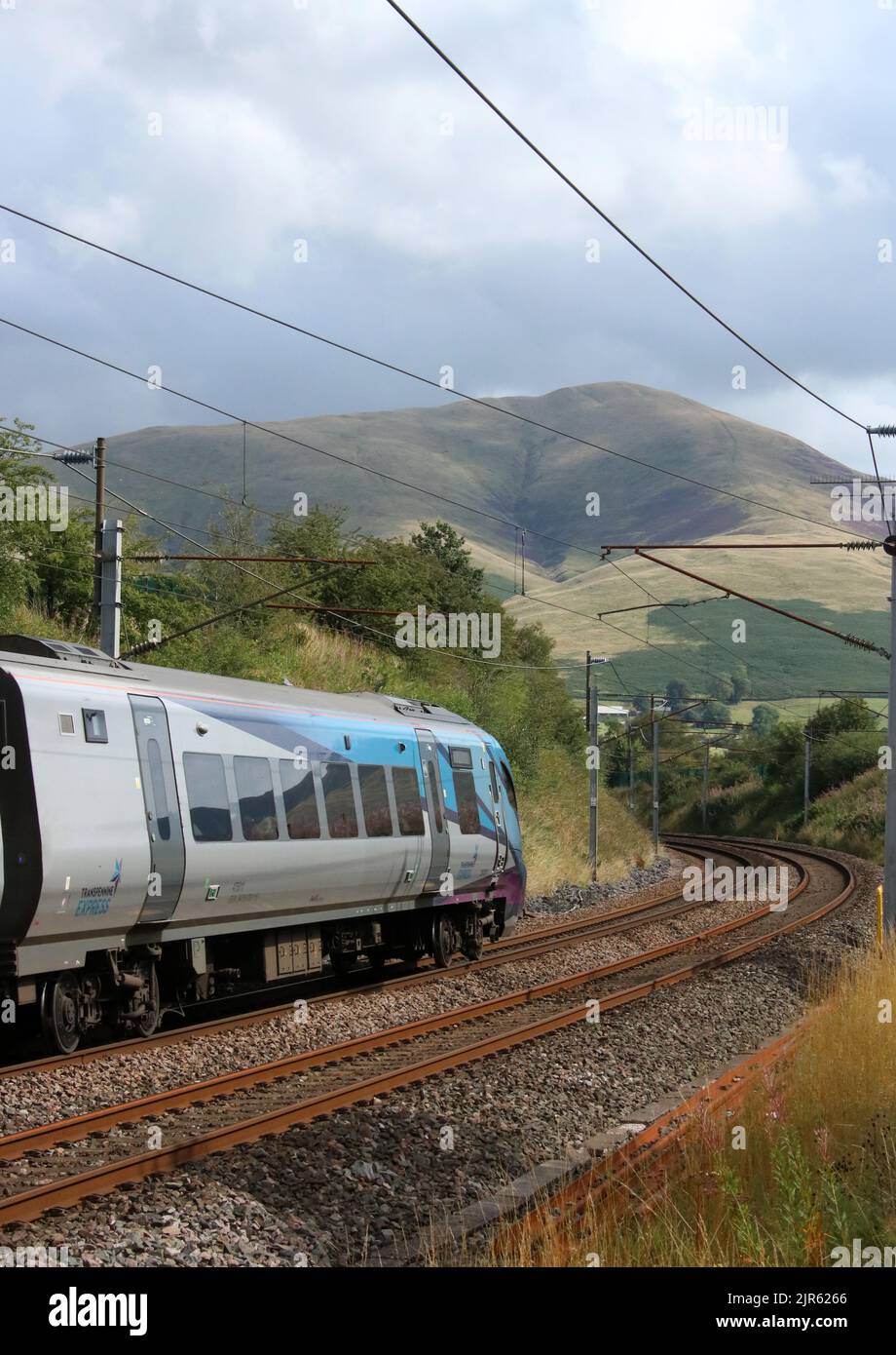 TransPennine Express Nova 2 class 397 civity electric train 397011 on West Coast Main Line in countryside at Lowgill in Cumbria on 22nd August 2022. Stock Photo