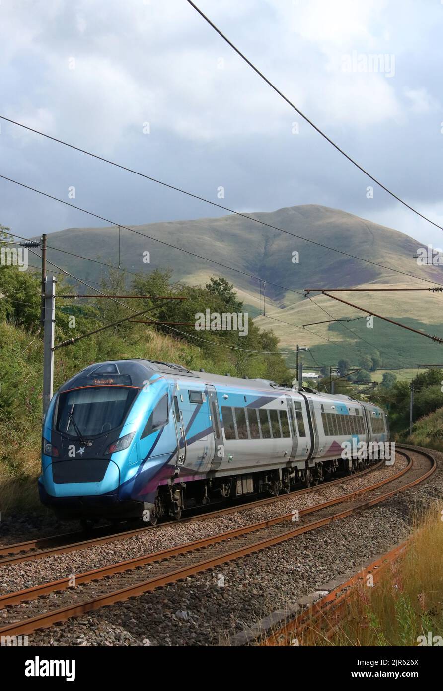 TransPennine Express Nova 2 class 397 civity electric train 397011 on West Coast Main Line in countryside at Lowgill in Cumbria on 22nd August 2022. Stock Photo