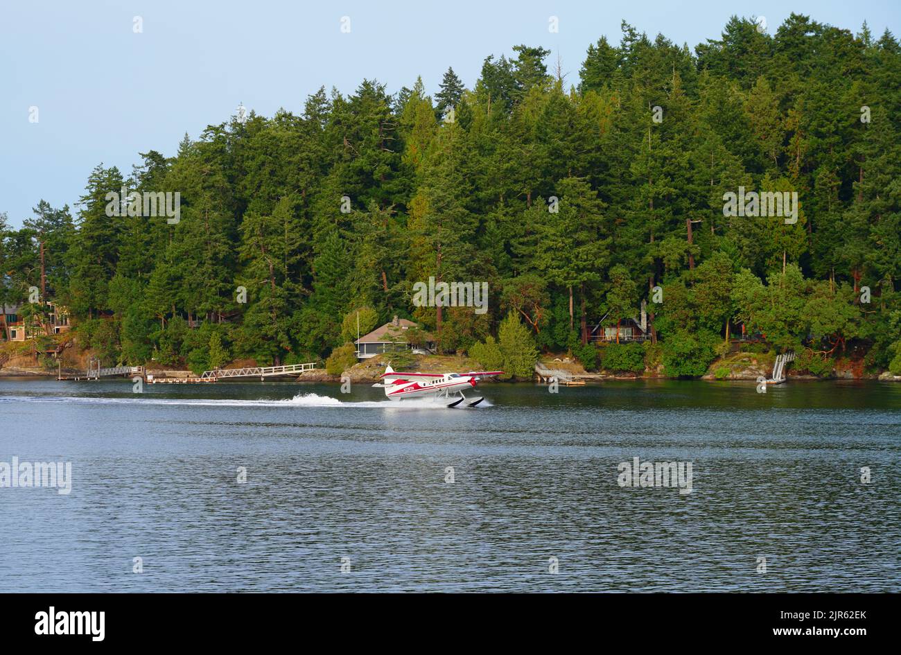 FRIDAY HARBOR, WA -1 OCT 2021- View of a seaplane on the water in the port of Friday Harbor, San Juan Islands, Washington State, United States. Stock Photo