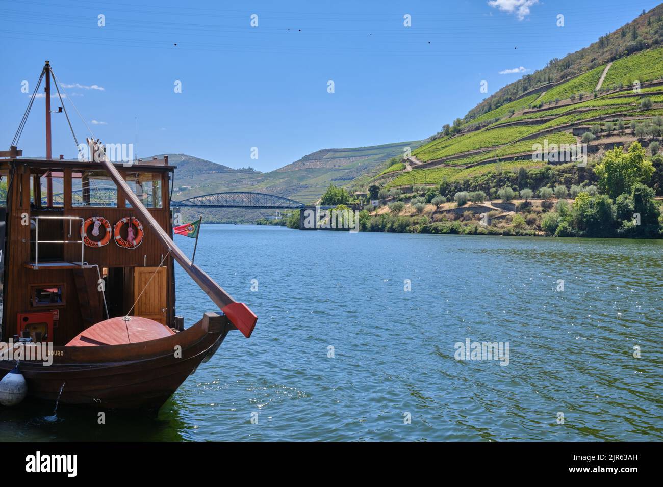 A traditional wooden tourist boat on the Douro river in Portugal