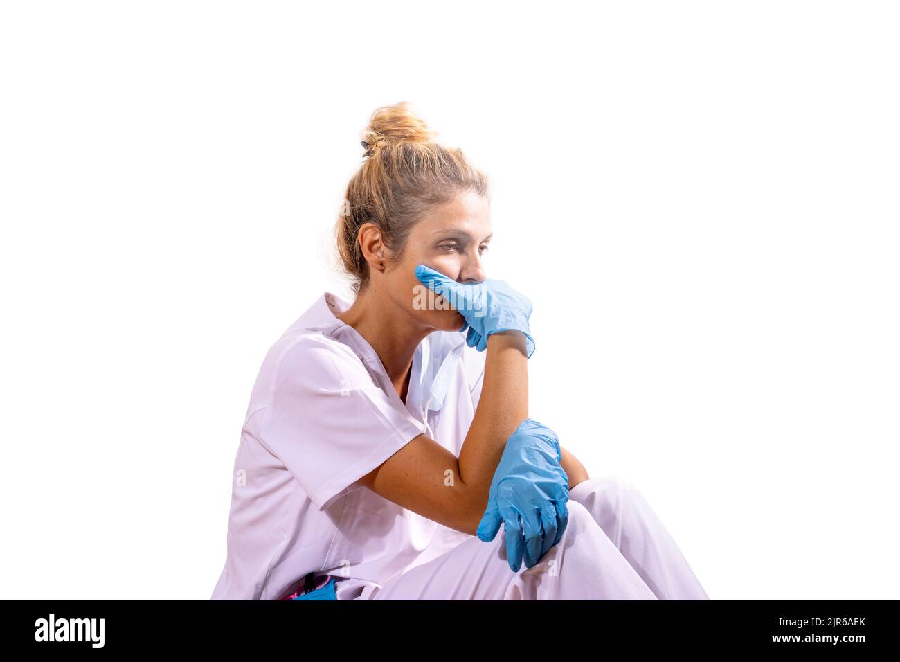 Medico girl defeated after a long day at the hospital. Stock Photo
