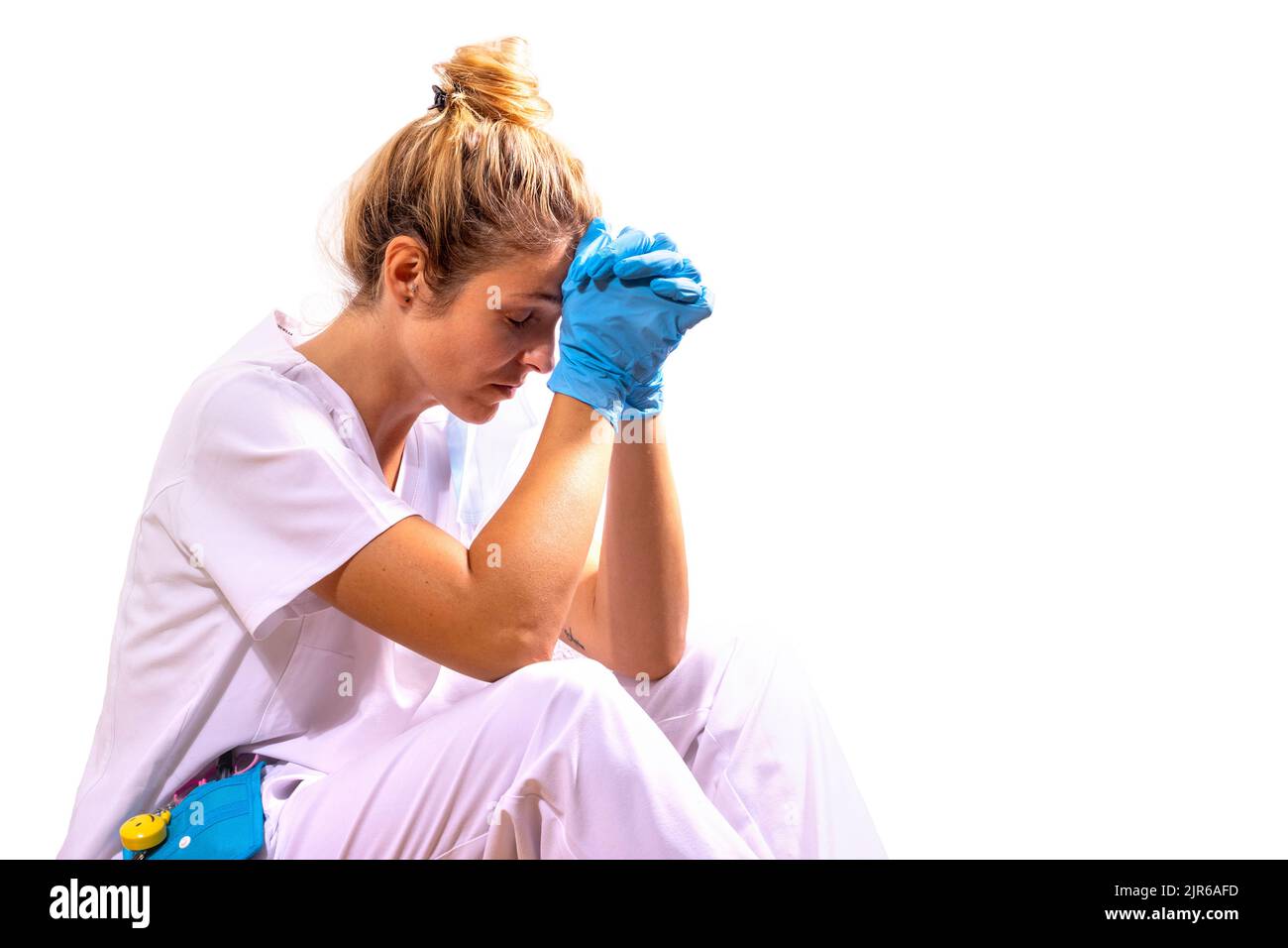 Medico girl defeated after a long day at the hospital. Stock Photo