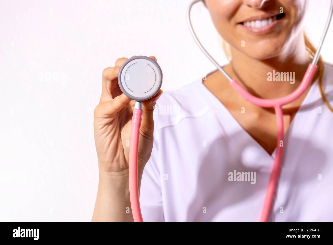 Doctor using stethoscope hi-res stock photography and images - Alamy