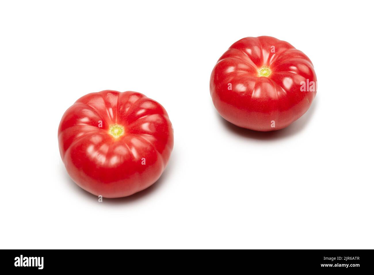 Red fresh tomato isolated on a white background Stock Photo - Alamy