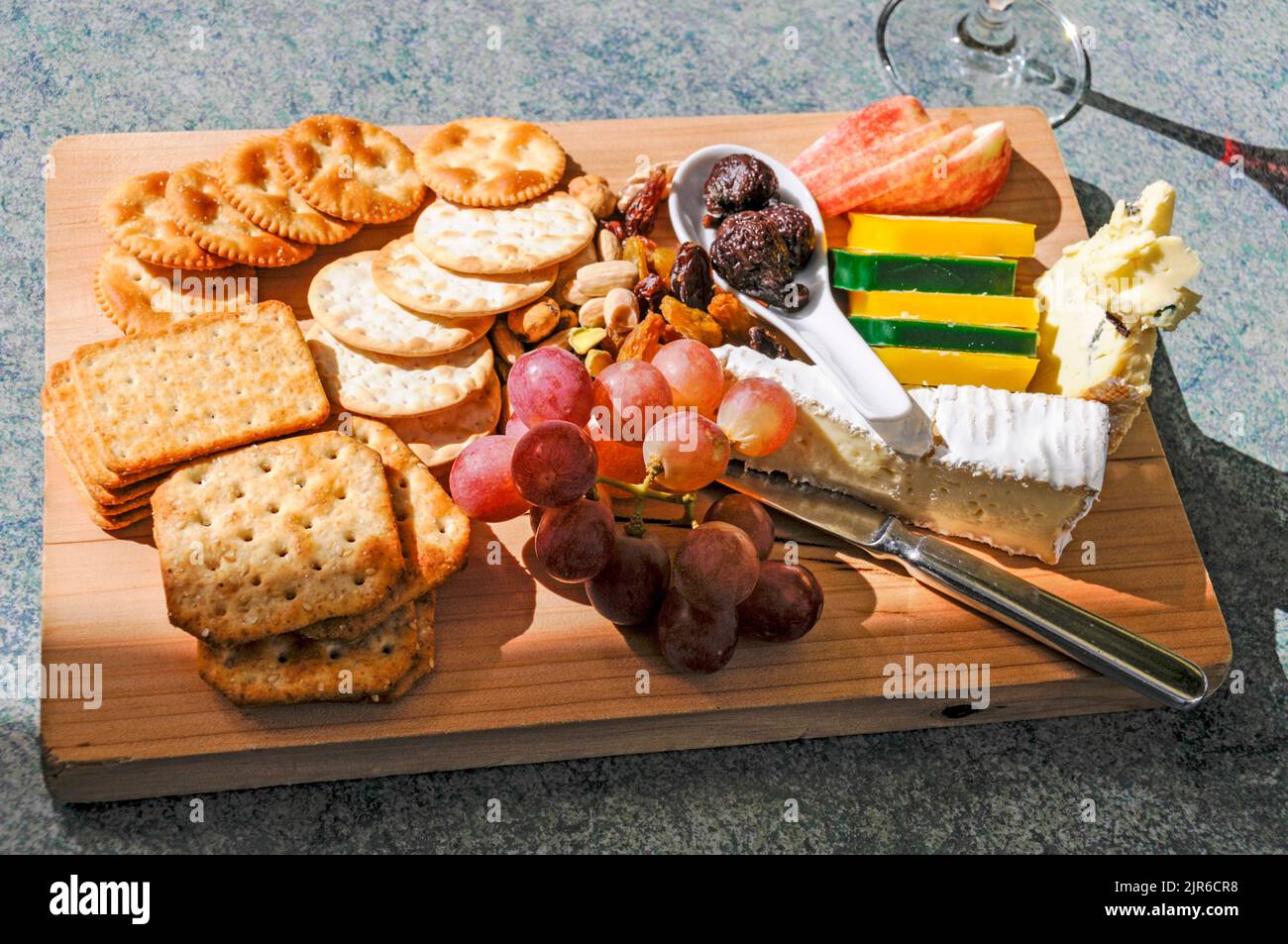 A glass of The Mission’s own Kapiti Port wine with a cheese