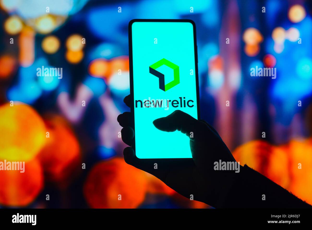 In this photo illustration, the New Relic logo is displayed on a smartphone screen Stock Photo