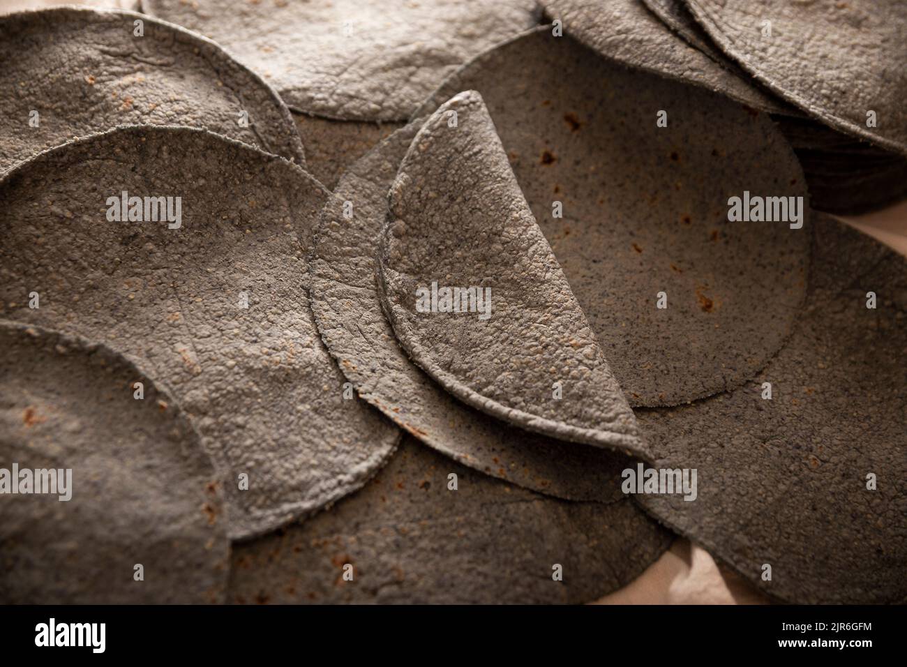 Blue Corn Tortillas. Food made with nixtamalized corn, a staple food in