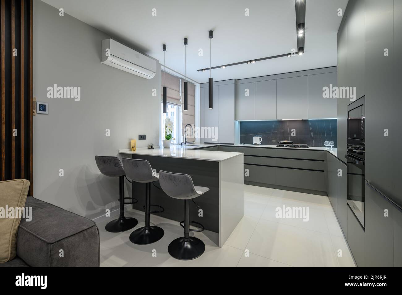 Luxury dining room and kitchen in studio apartment Stock Photo Alamy