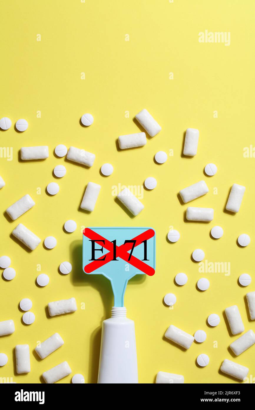 Titanium dioxide, E171, dangerous additive concept. gum, pills