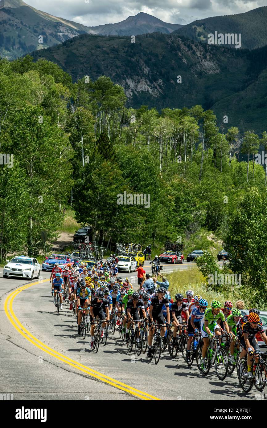 Bicycle riders riding up McClure Pass, USA Pro Challenge bicycle race, Colorado USA Stock Photo