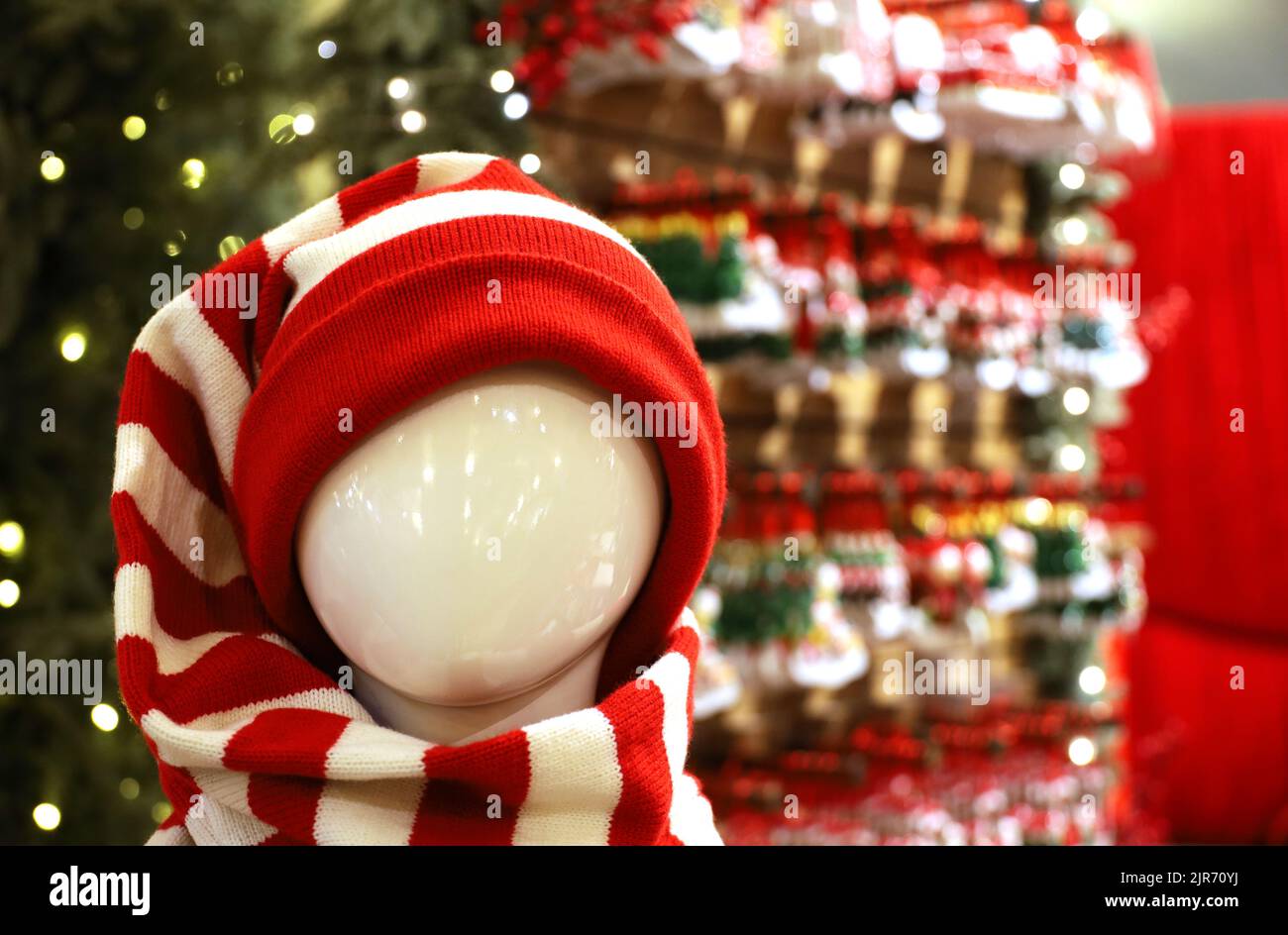 Hood with Christmas pattern in a store. Traditional warm outfit for New Year holidays Stock Photo