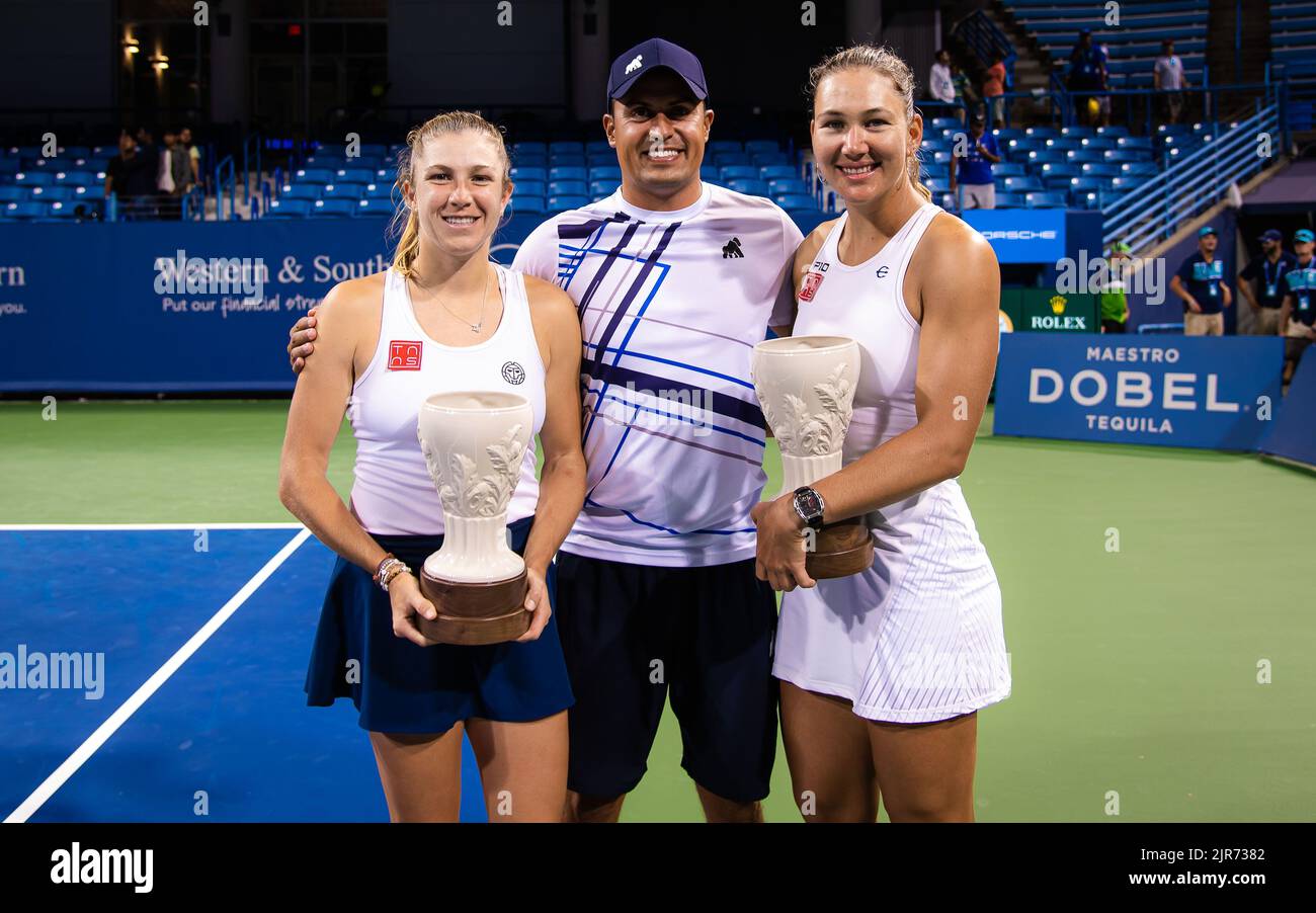 Nicole Melichar-Martinez of the United States & Ellen Perez of Australia  pose with their runner-up trophies after the doubles final of the 2022  Western & Southern Open, WTA 1000 tennis tournament on