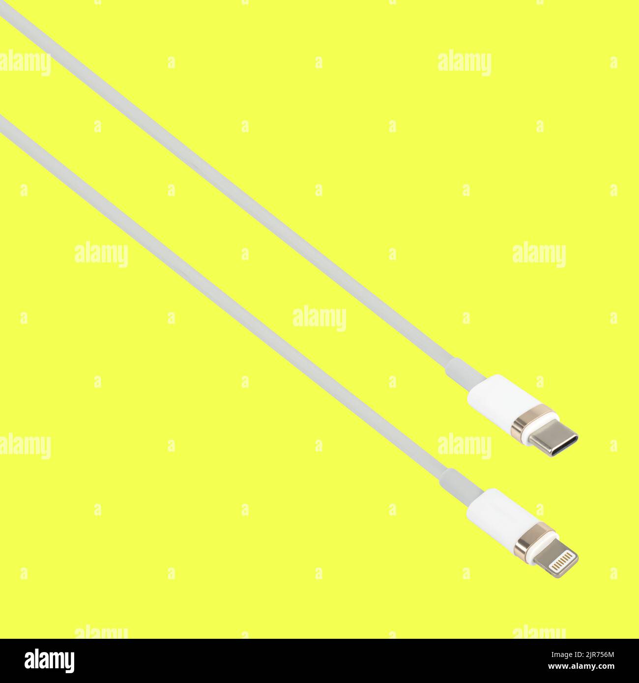 cable with Type-C and Lightning connector, on a yellow background in ...