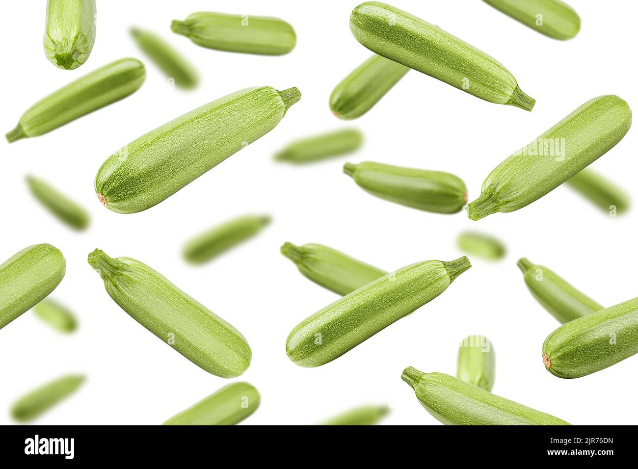 Falling zucchini isolated on white background, clipping path, full
