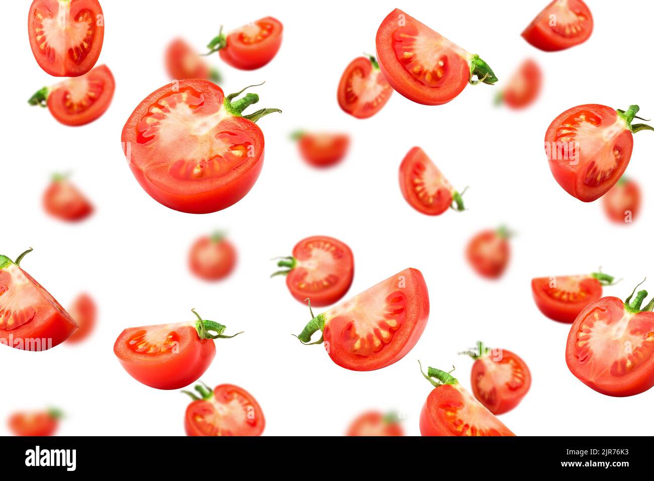 Falling tomato isolated on white background, selective focus Stock Photo