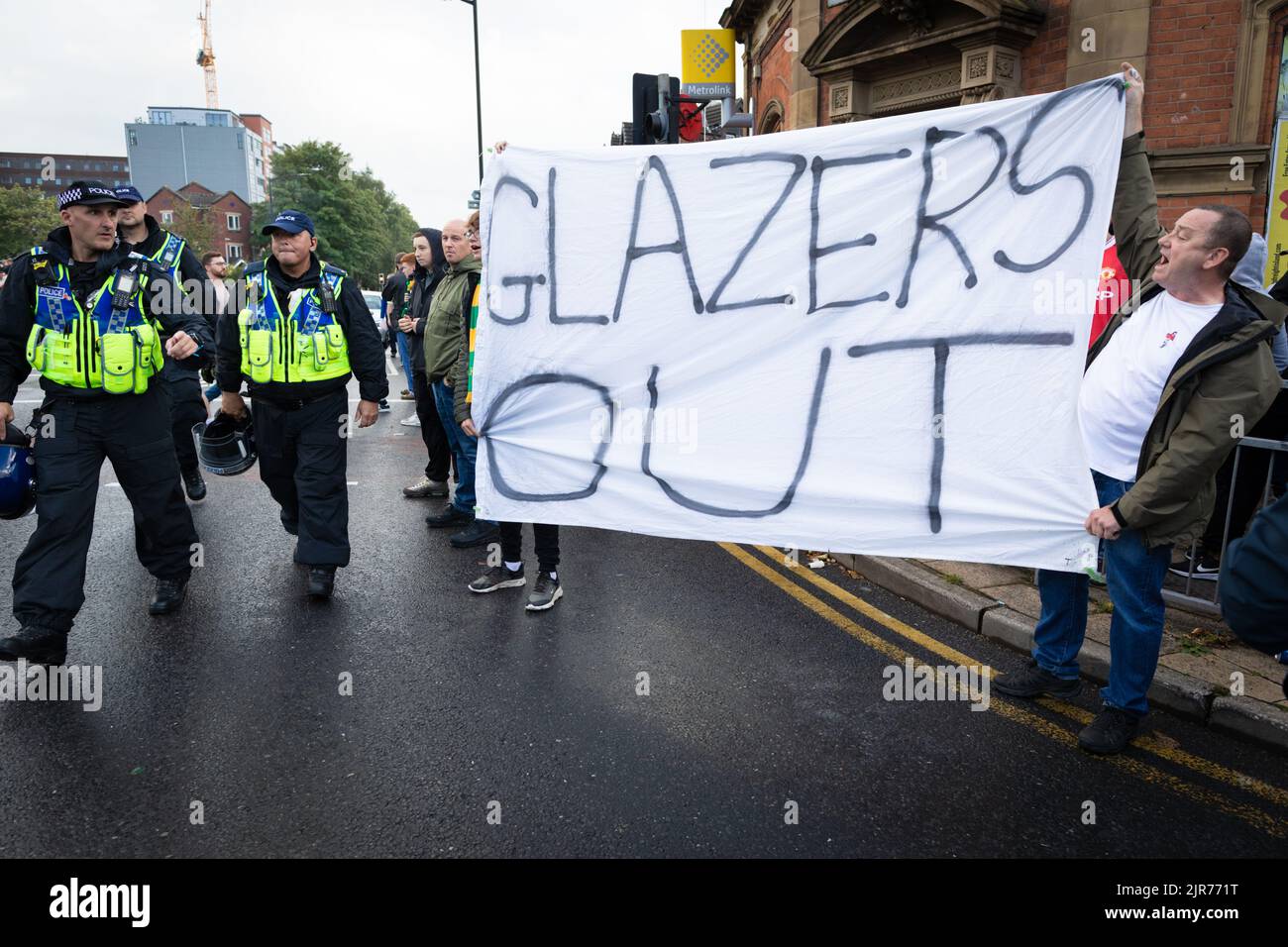 Manchester, UK. 22nd Aug, 2022. Man United fans await the start of the march to Old Trafford ahead of their game against Liverpool. The protests continue against the Glazers ownership of the club. Credit: Andy Barton/Alamy Live News Stock Photo