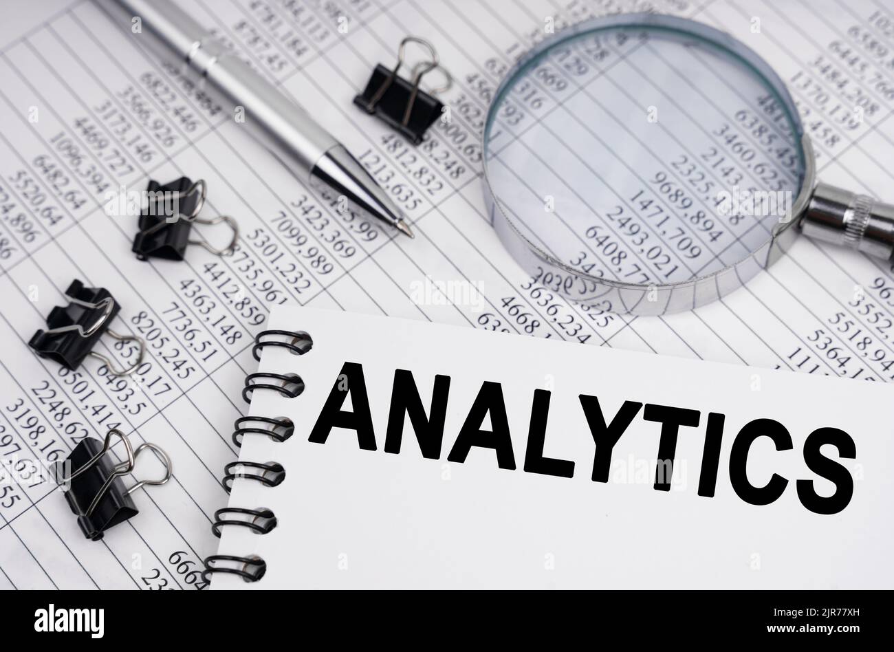 Business and economics concept. On the table is a magnifying glass