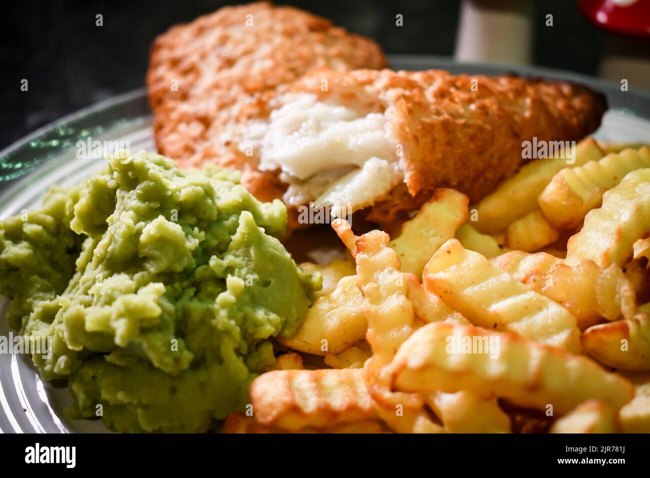 home made fish and chips in the oven Stock Photo Alamy