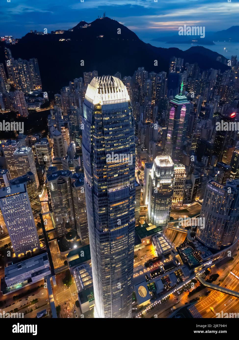 A vertical high angle view of the IFC Central Hong Kong at dusk Stock Photo