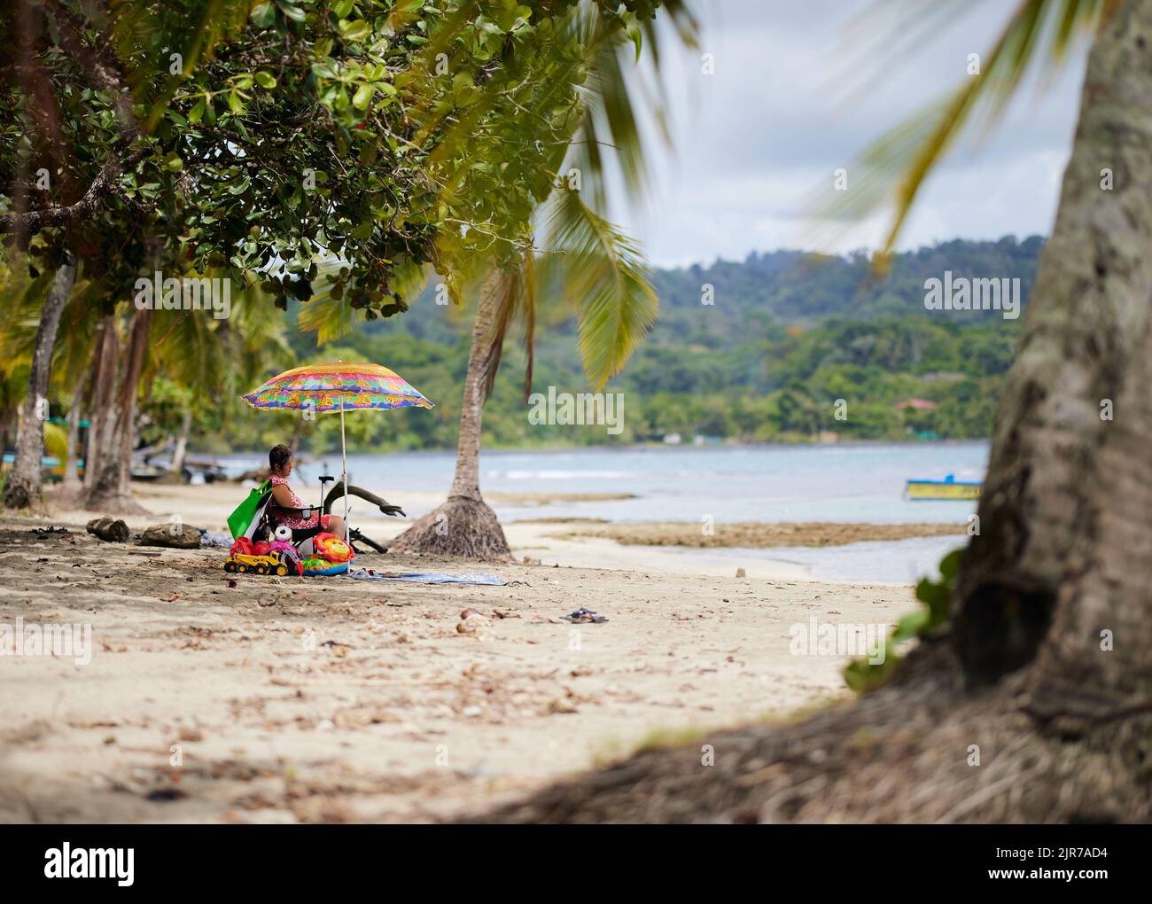 A female at the beach of the Caribbean at Puerto Viejo, Coast Rica Stock Photo