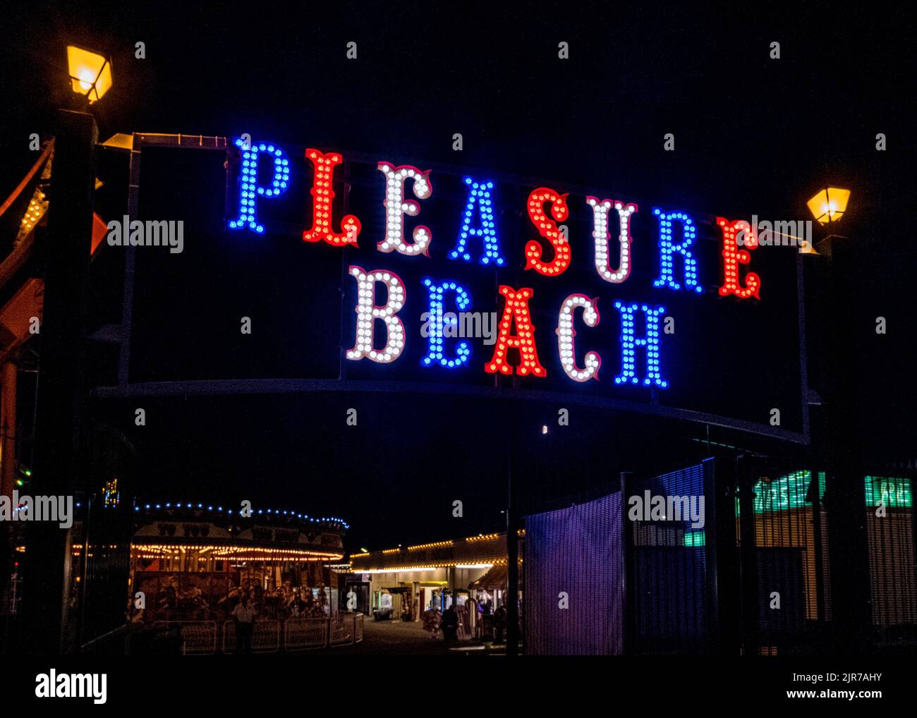 Neon Lights in the night sky for the 'Pleasure Beach' in Great Yarmouth, a seaside town in Norfolk, England, UK. Stock Photo