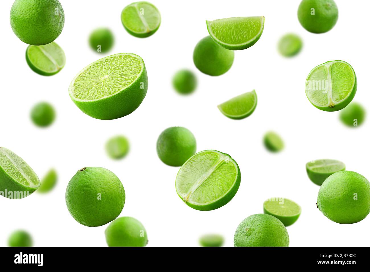 Falling lime isolated on white background, selective focus Stock Photo