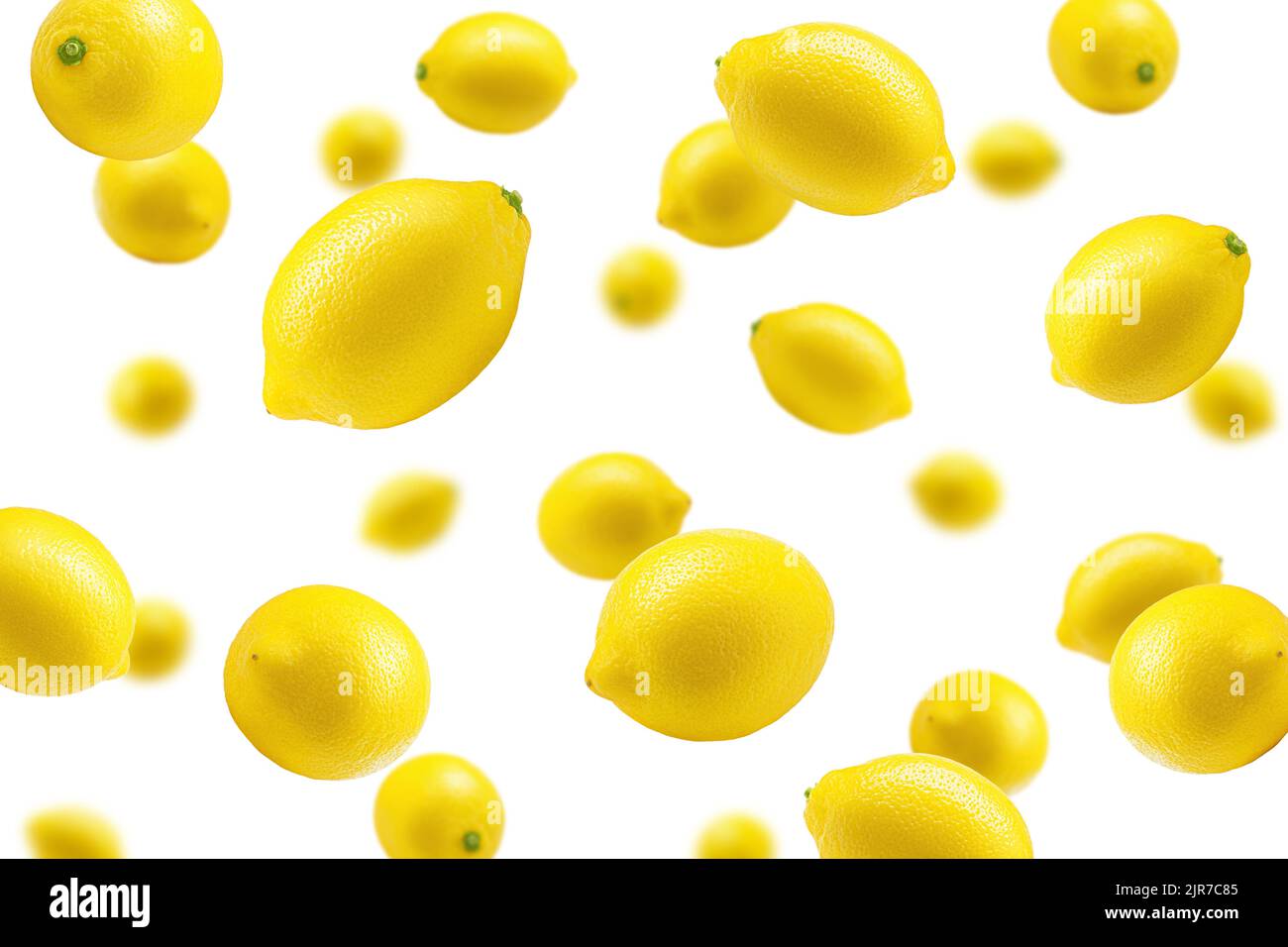 Falling lemon on white background, selective focus Stock Photo