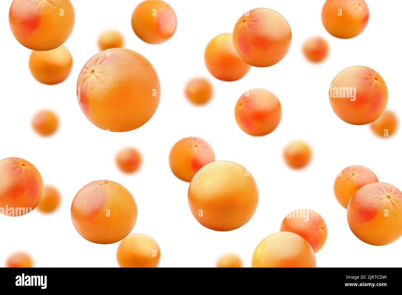 Falling grapefruits isolated on white background, selective focus Stock Photo