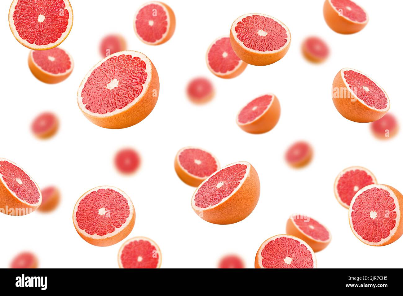 Falling grapefruits isolated on white background, selective focus Stock Photo