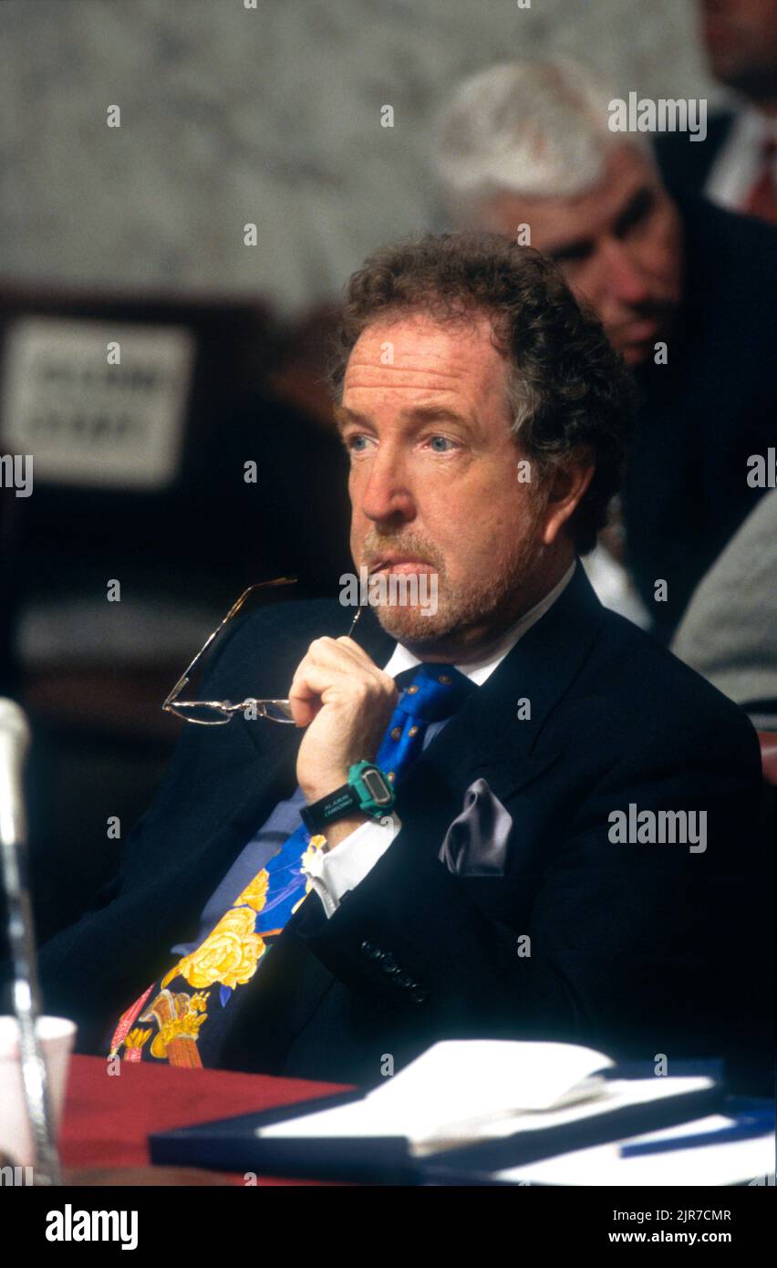 Chief Counsel for the Senate Campaign Finance investigation Michael J. Madigan listens to testimony at the Senate Governmental Affairs Committee hearings into allegations of illegal and improper fundraising practices by the Democrats during the last 1996 presidential election, July 8, 1997 in Washington, D.C. Stock Photo