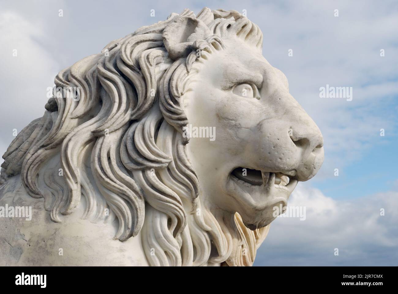 Sculpture of a lion in front of the main facade of Vorontsov Palace in Alupka, Crimea, Ukraine. Six statues by Giovanni Bonnani was installed in 1848 Stock Photo