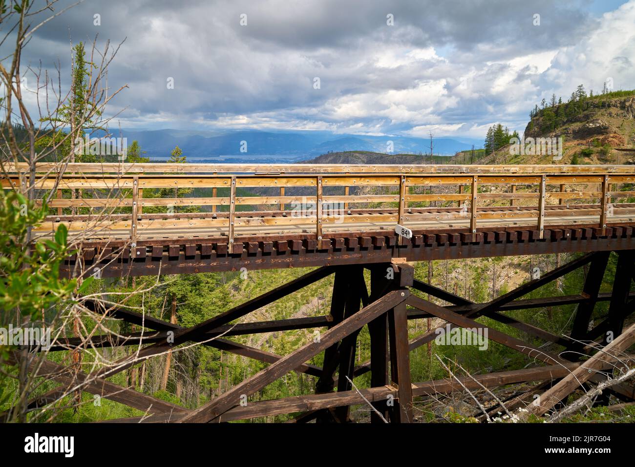 Myra Canyon Trestle 18 Kelowna. Historic railroad trestles used for biking and hiking surround Myra Canyon located in Myra-Bellevue Provincial Park in Stock Photo