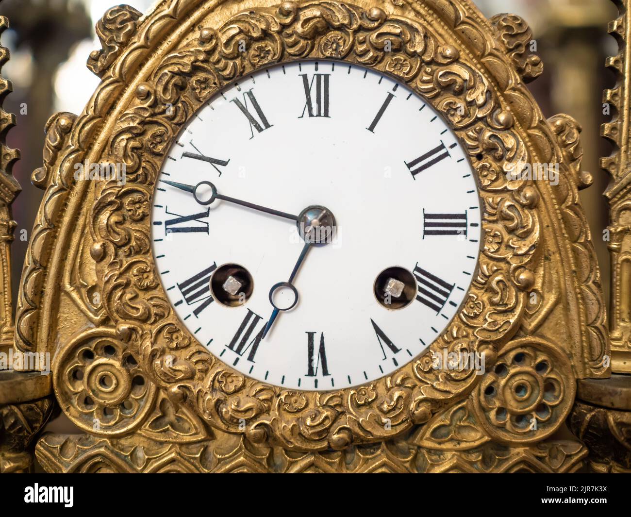 Old antique clock of the 19th century. Antiques and Collectibles. Stock Photo