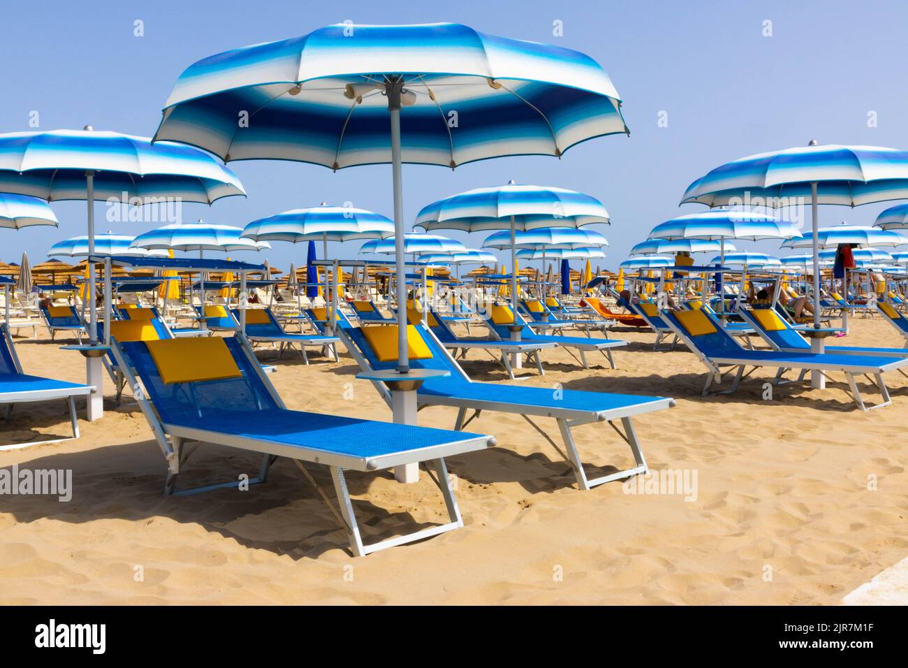 Traditional beach chair and umbrella. Rimini, Italy Stock Photo - Alamy