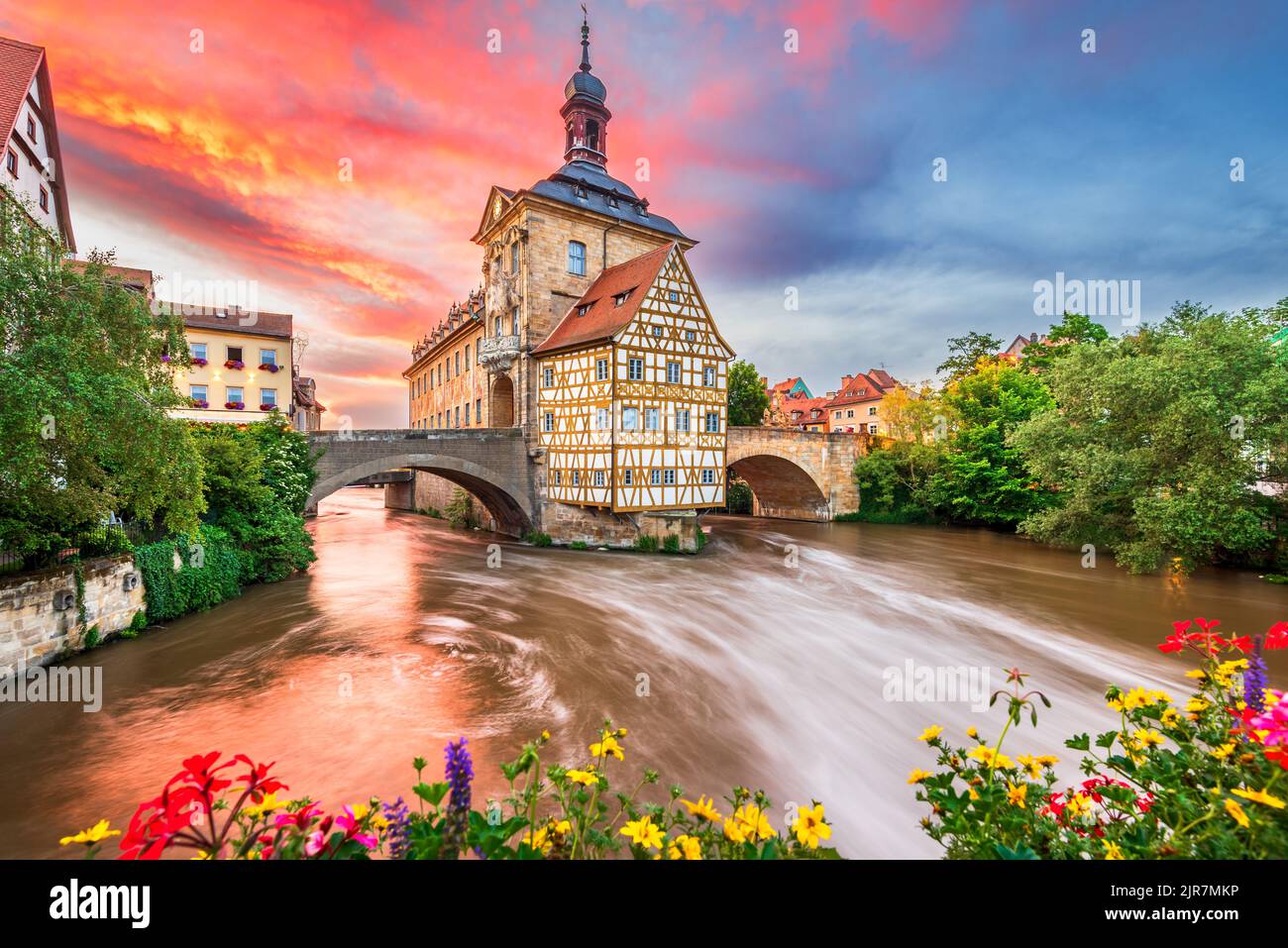 Bamberg, Germany. Colored sunset with oldtown and Regnitz River. Franconia, Bavaria - city break travel sight. Stock Photo