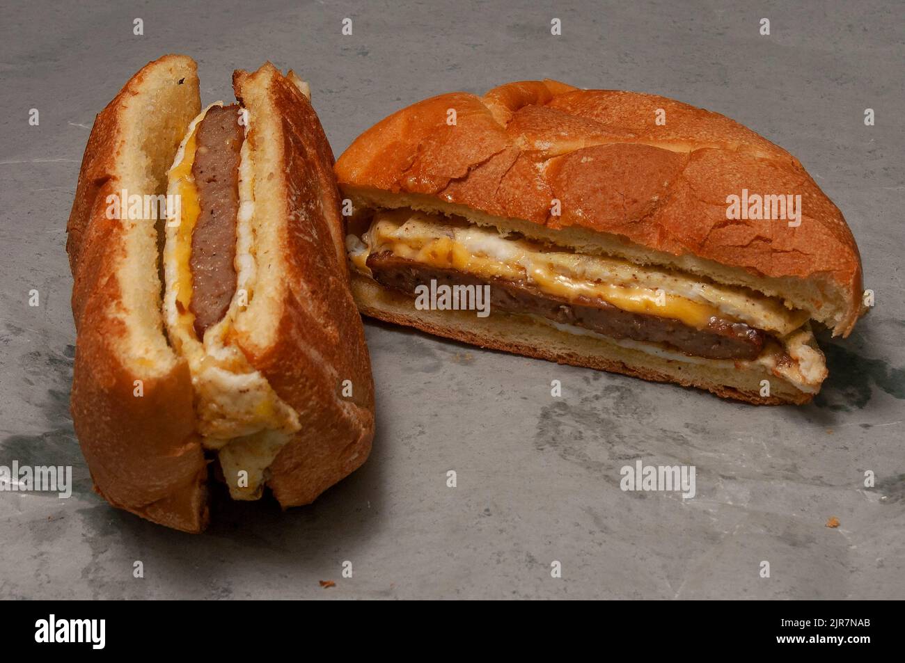Hearty sausage egg and cheese biscuit breakfast sandwich Stock Photo
