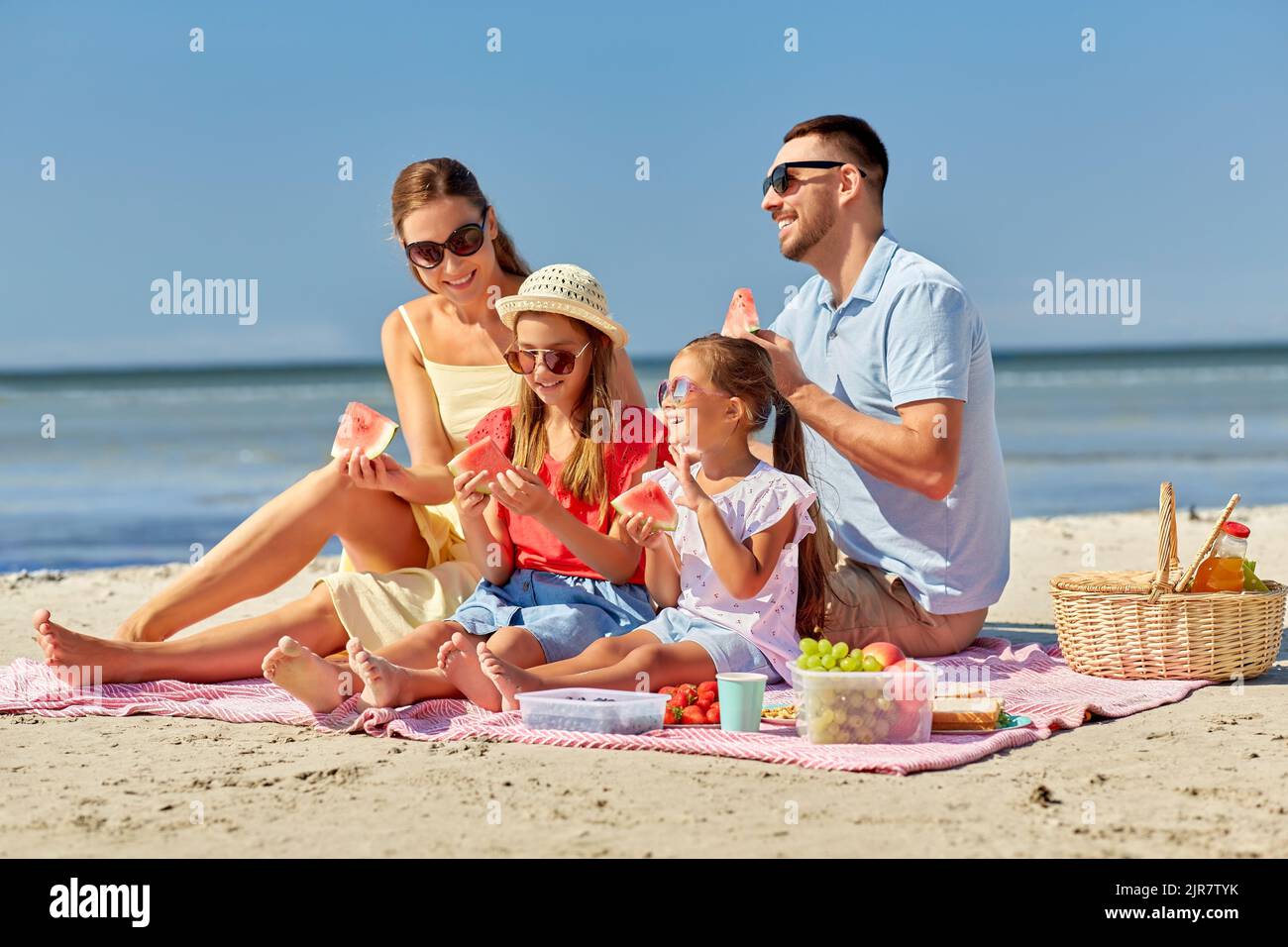 Family having picnic beach hi-res stock photography and images - Alamy