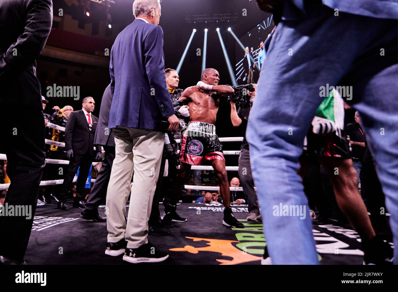 Professional boxer WBA interim super-lightweight Alberto Puello defeats WBA Super-Lightweight Batyr Akhmedov in Professional Boxing match Stock Photo