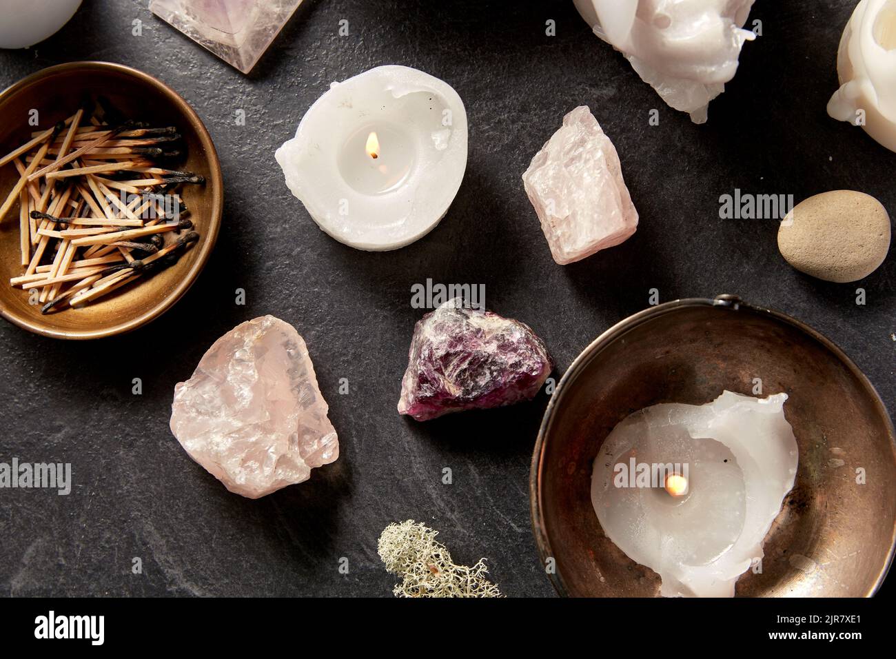 burning candles and crystals for magic ritual Stock Photo Alamy