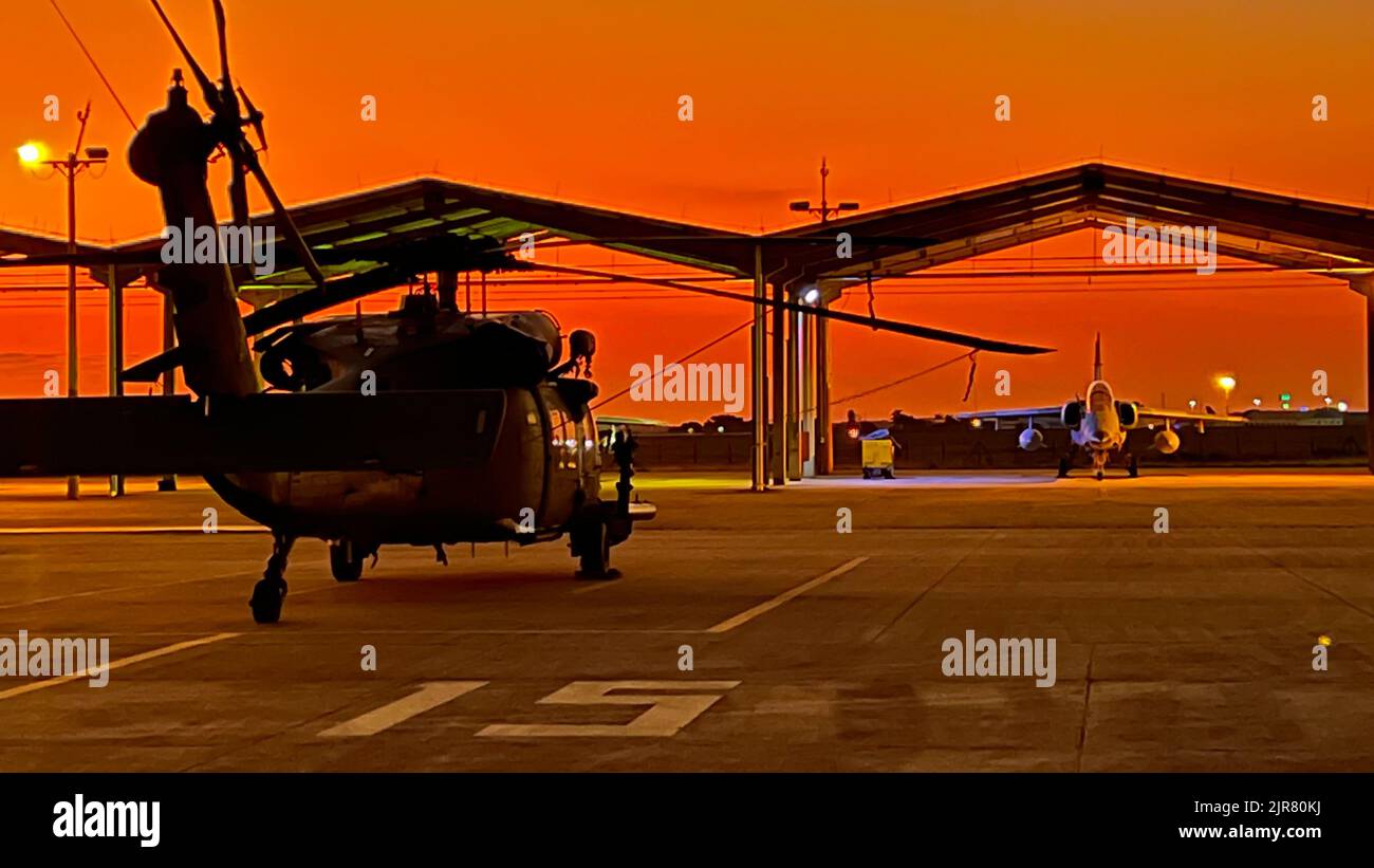 HH-60 Pave Hawk rescue helicopters  assigned to the 106th Rescue Wing of the New York Air National Guard, ready for operations at Campo Grande, Brazil on August 21, 2022. The aircraft was shipped to Brazil on board a C-17 flown by the New York Air National Guard’s 105th Airlift Wing to participate in Exercise Tapio, a combined Brazilian- U.S. irregular warfare exercise. The New York Air National Guard dispatched 100 Airmen from the two wings to participate as part of the State Partnership Program relationship with Brazil, (U.S. Air National Guard photo by Major Michael O’Hagan) Stock Photo