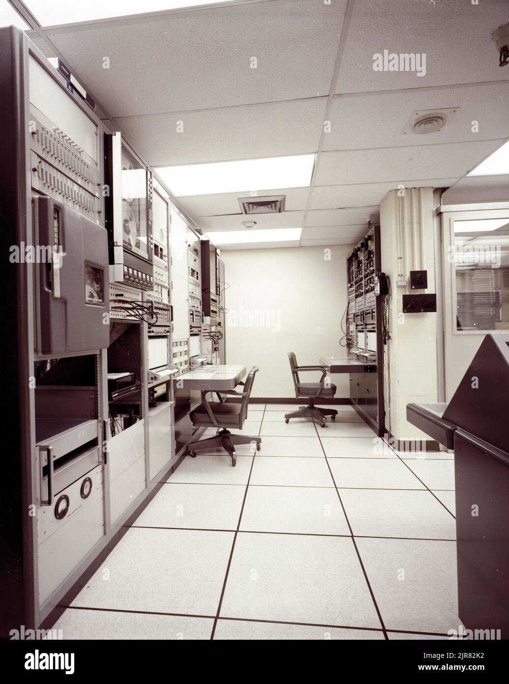 A810229 COMPUTER ROOM DOCUMENTATION CARTER BROYLES (Project Engineer) APR 15 81EG&G/NTS PHOTO LAB Publication Date: 4/15/1981  BROYLES, CARTER; COMPUTATIONAL EQUIPMENT; COMPUTER ROOM DOCUMENTATION; COMPUTER ROOMS; COMPUTERS; DOCUMENTATION; EDGERTON, GERMESHAUSEN & GRIER; EG&G; EQUIPMENT & INSTRUMENTS; EQUIPMENT (SNL); INSTRUMENTS & EQUIPMENT; NEVADA; NEVADA TEST SITE; NTS; NUCLEAR ENERGY TECHNOLOGY; NUCLEAR TESTING; ROOMS & BUILDING AREAS; TABLES; TEST SITES; UGT; UNDERGROUND TESTING; WIRE & CABLES  historical images. 1972 - 2012. Department of Energy. National Nuclear Security Administration. Stock Photo