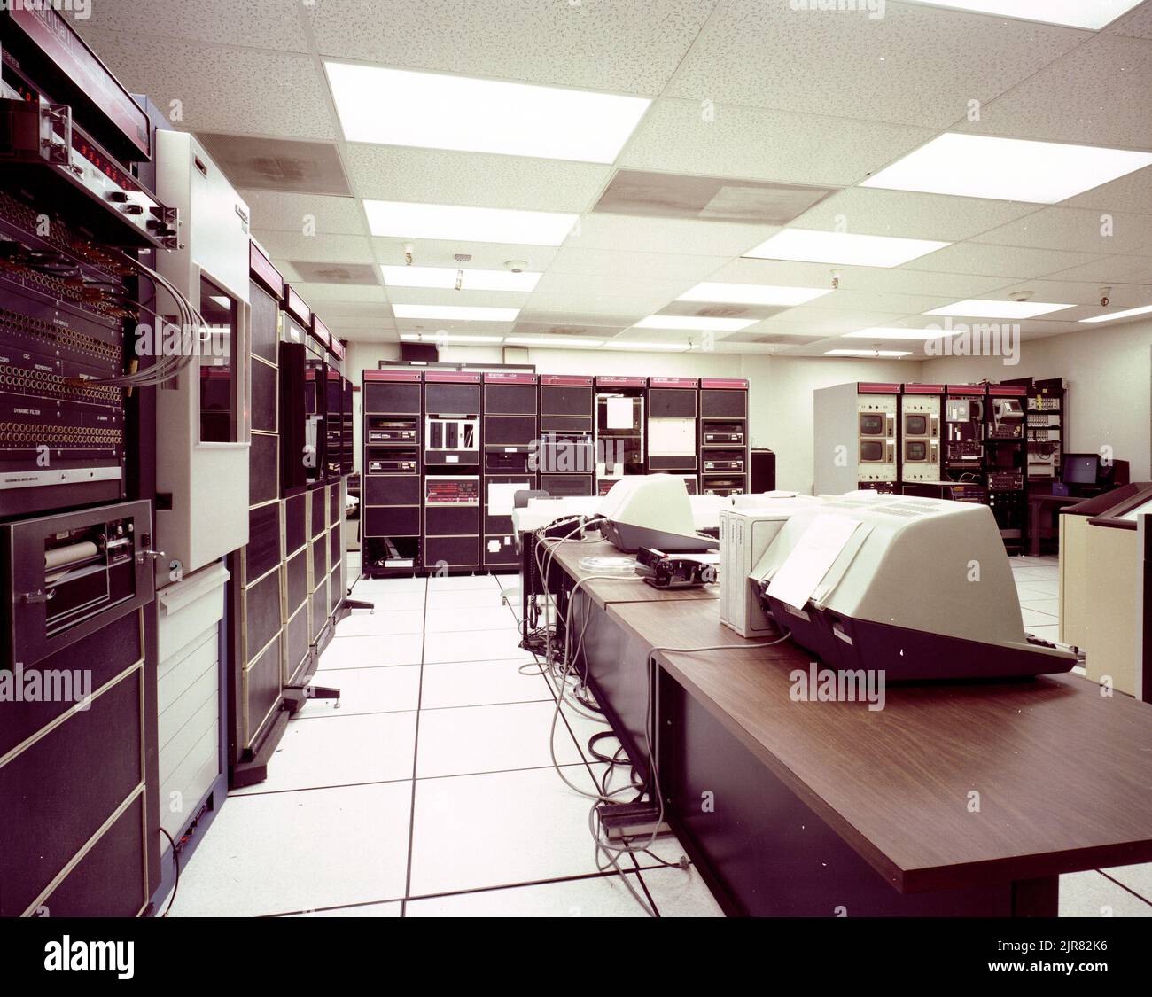A810227 COMPUTER ROOM DOCUMENTATION CARTER BROYLES (Project Engineer) APR 15 81EG&G/NTS PHOTO LAB Publication Date: 4/15/1981  BROYLES, CARTER; COMPUTATIONAL EQUIPMENT; COMPUTER ROOM DOCUMENTATION; COMPUTER ROOMS; COMPUTERS; DOCUMENTATION; EDGERTON, GERMESHAUSEN & GRIER; EG&G; EQUIPMENT & INSTRUMENTS; EQUIPMENT (SNL); INSTRUMENTS & EQUIPMENT; NEVADA; NEVADA TEST SITE; NTS; NUCLEAR ENERGY TECHNOLOGY; NUCLEAR TESTING; ROOMS & BUILDING AREAS; TABLES; TEST SITES; UGT; UNDERGROUND TESTING; WIRE & CABLES  historical images. 1972 - 2012. Department of Energy. National Nuclear Security Administration. Stock Photo