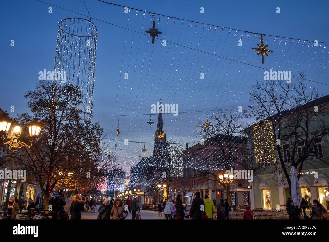 Picture of Christmas decorations on the pedestrian street of Zmaj Jovina Ulica, in Novi Sad, Serbia, during a winter dusk. Novi Sad is the second larg Stock Photo