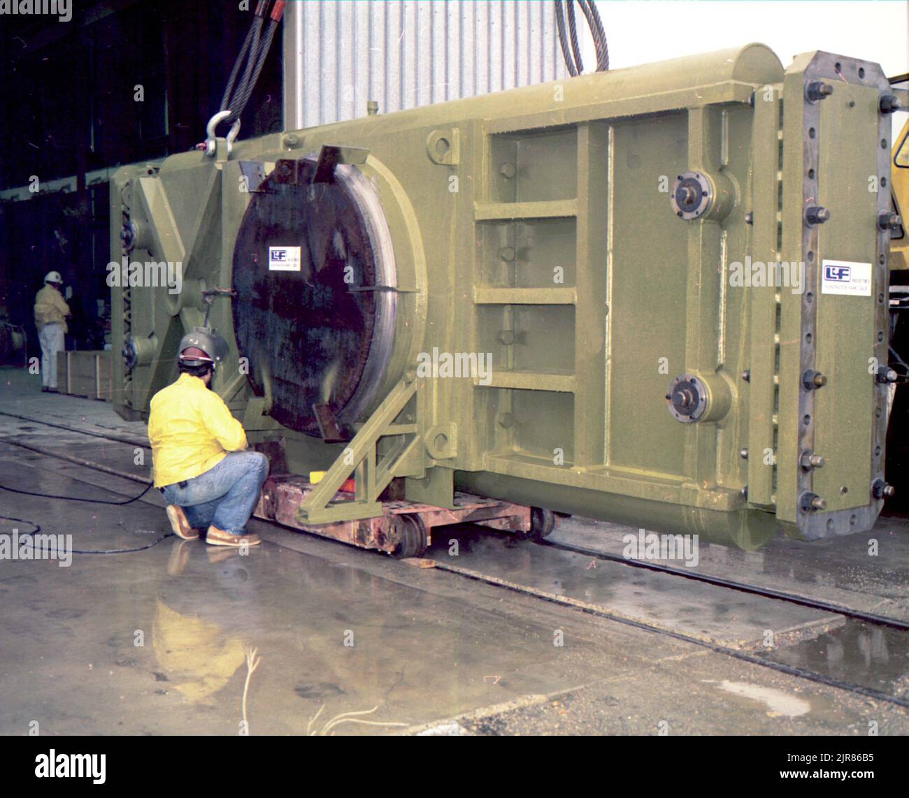 A800142 U12N MINERS IRON DAC UNLOADING TEISHER(Project Engineer) JAN 7 80EG&G/NTS PHOTO LAB Publication Date: 1/7/1980  DAC UNLOADING; DACS; EQUIPMENT & INSTRUMENTS; HARD HATS; INSTRUMENTS & EQUIPMENT; MINERS IRON; MINERS, IRON ORE; MINES (WEAPON); N-TUNNEL; NEVADA; NEVADA TEST SITE; NTS; NUCLEAR ENERGY TECHNOLOGY; TEST SITES; UGT; UNDERGROUND TESTING  historical images. 1972 - 2012. Department of Energy. National Nuclear Security Administration. Photographs Related to Nuclear Weapons Testing at the Nevada Test Site. Stock Photo
