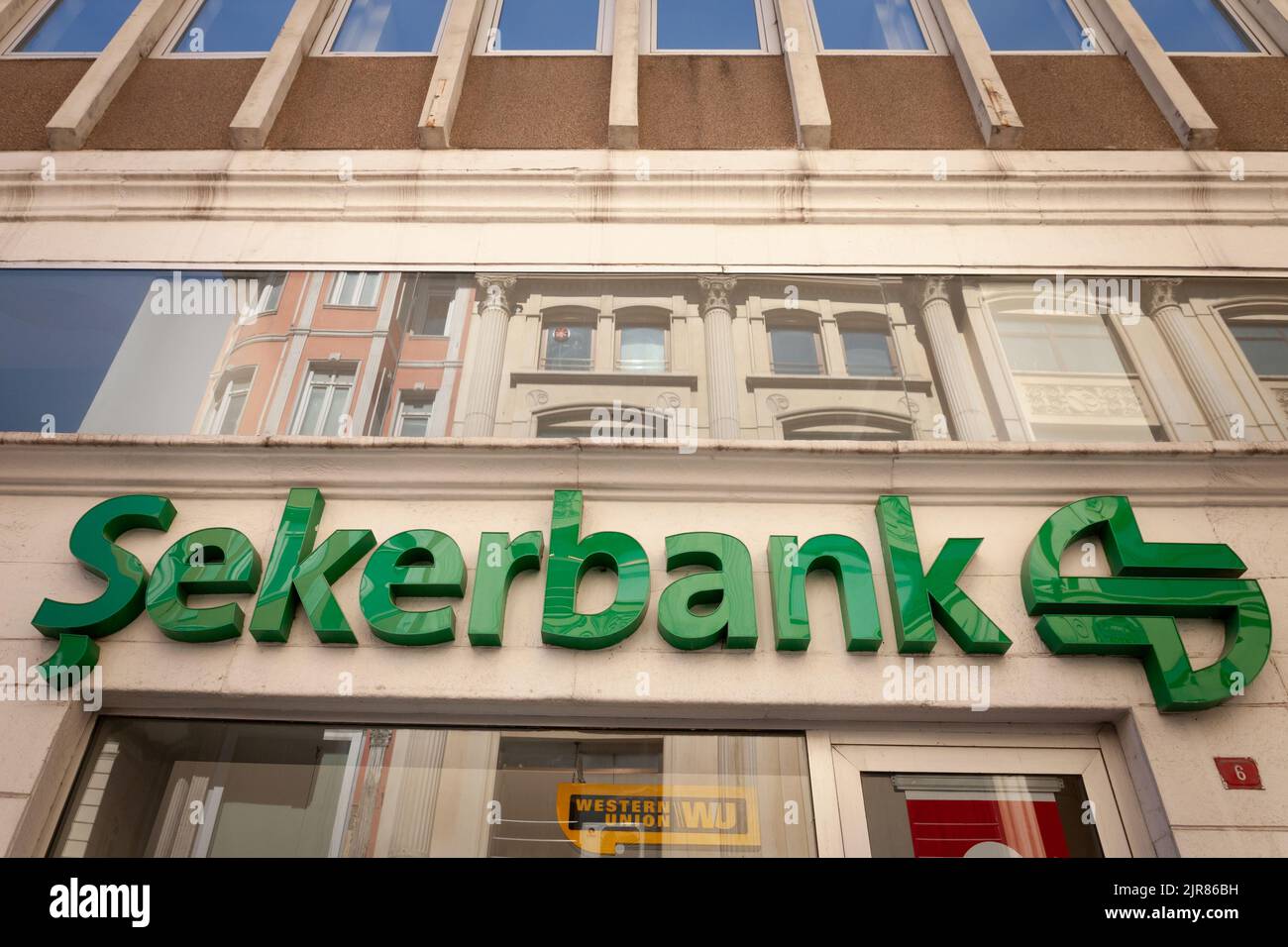 Picture of a sign with the logo of Sekerbank taken in front of their local bank in Istanbul, Turkey. Şekerbank A.Ş was founded in 1953 as the Sugar Be Stock Photo